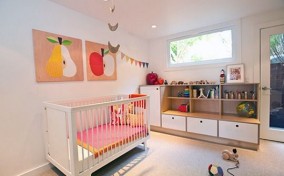 Decoración moderna para la habitación del bebé con manzana