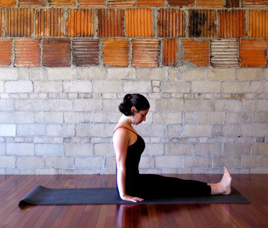Postura de bastón en yoga