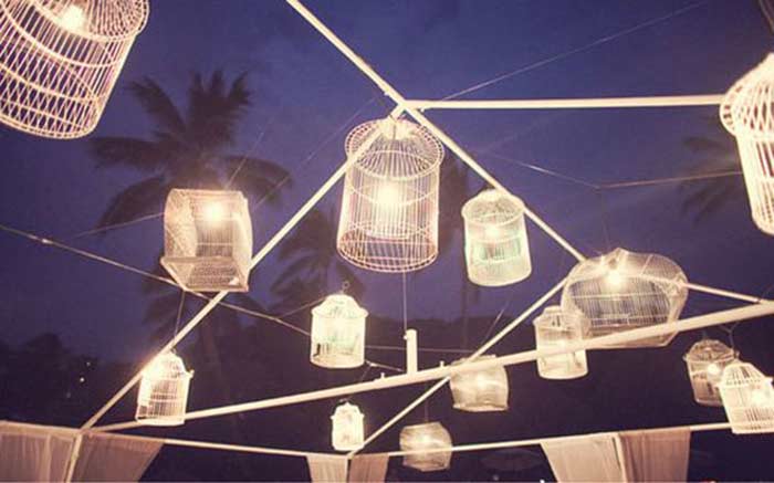 Decoraciones de lámparas hechas con jaulas para pájaros